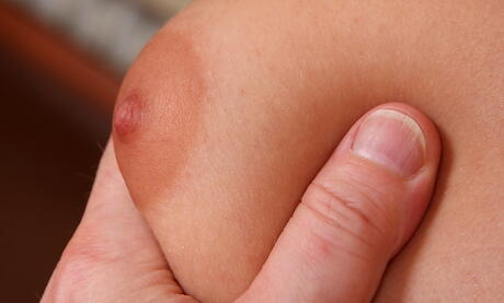 Slender teen Kendra Stone bares her butt and shaved pussy 